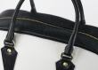 Ladies' handbag in white and black with a padlock Thumb