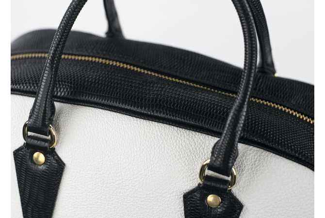 Ladies' handbag in white and black with a padlock