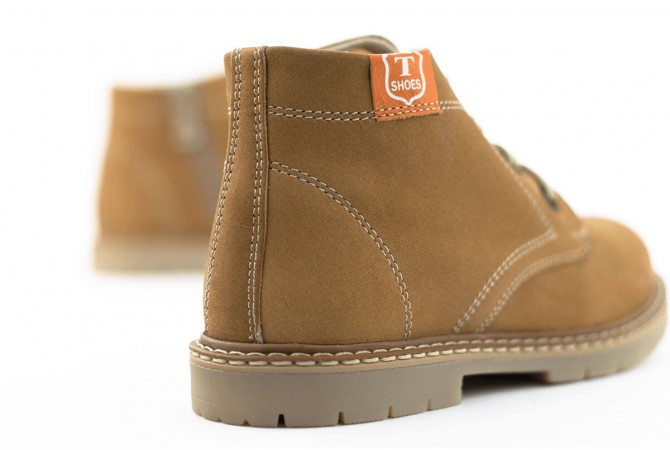 Children's boots in dark beige color